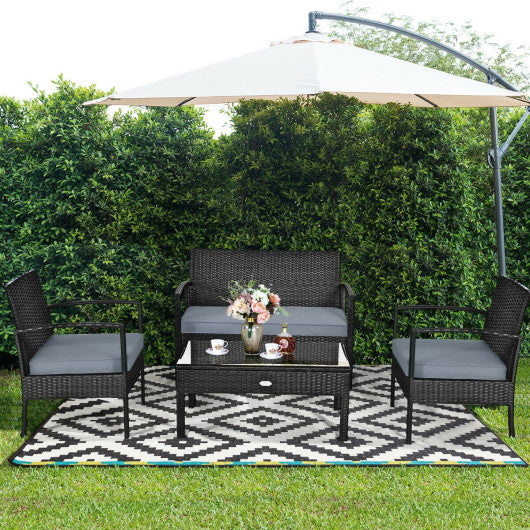 4 Pieces Patio Rattan Cushioned Furniture Set with Loveseat and Table-Black